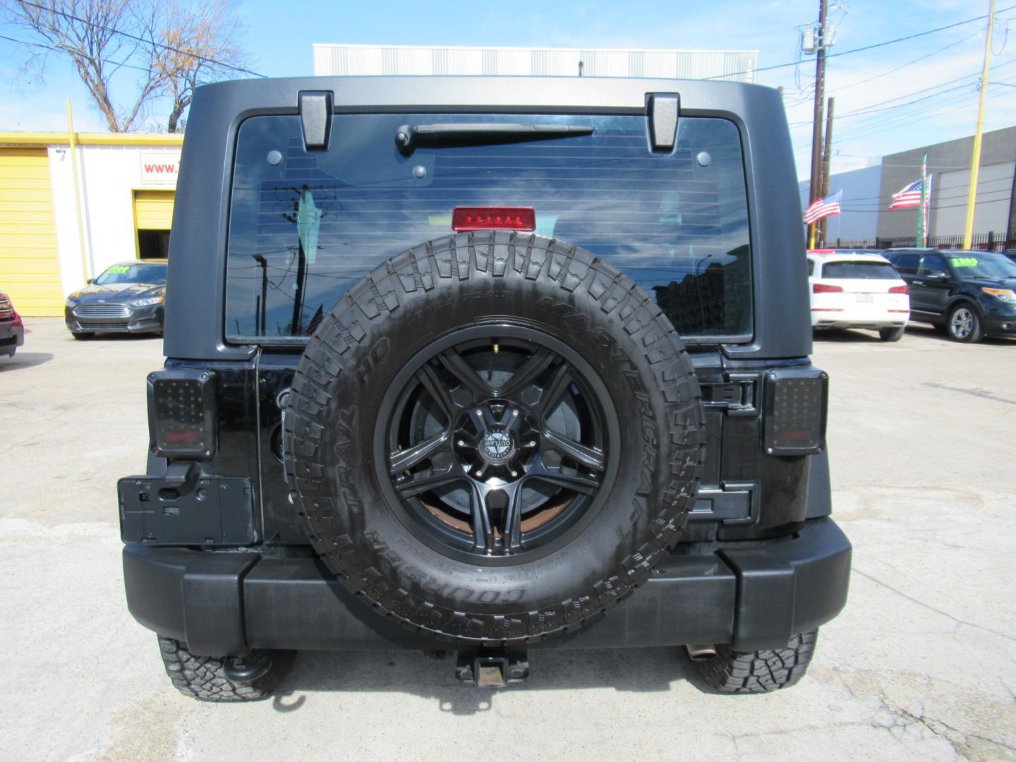 2017 Black /Black Jeep Wrangler UNLIMITED SPORT (1C4BJWDG1HL) with an 3.6L V6 F DOHC 24V engine, Automatic transmission, located at 1511 North Shepherd Dr., Houston, TX, 77008, (281) 657-1221, 29.798361, -95.412560 - 2017 JEEP WRANGLER UNLIMITED SPORT VIN: 1C4BJWDG1HL517754 1 C 4 B J W D G 1 H L 5 1 7 7 5 4 4 DOOR WAGON/SPORT UTILITY 3.6L V6 F DOHC 24V GASOLINE REAR WHEEL DRIVE W/ 4X4 - Photo#27